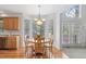 Bright breakfast nook with views of the backyard at 315 Birdwood Ct, Cary, NC 27519