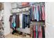 Spacious walk-in closet with ample shelving and hanging space for optimal organization, plus shoe storage at 315 Birdwood Ct, Cary, NC 27519
