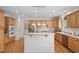 Spacious kitchen with center island, stainless steel appliances, and lots of cabinets at 315 Birdwood Ct, Cary, NC 27519