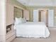 The main bedroom is bright and features built-in cabinets and an attached ensuite bathroom at 315 Birdwood Ct, Cary, NC 27519