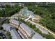 Aerial view of townhomes with tennis courts, playground and community garden at 3825 Cary Glen Blvd, Cary, NC 27519