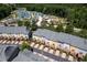 Aerial view of modern townhomes close to community playground and tennis courts at 3825 Cary Glen Blvd, Cary, NC 27519