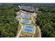 Aerial view of community tennis courts, playground, and green space with walking trails at 3825 Cary Glen Blvd, Cary, NC 27519
