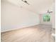 Bright, open living area with laminate flooring, large window and ample space for living at 3825 Cary Glen Blvd, Cary, NC 27519