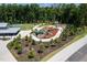 Aerial of community playground, seating areas, lush landscaping, trees and walking path at 3825 Cary Glen Blvd, Cary, NC 27519