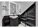 Modern bathroom with open shelving and a sleek vanity at 406 E Whitaker Mill Rd, Raleigh, NC 27608