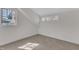Cozy bedroom with neutral carpet and bright natural light at 406 E Whitaker Mill Rd, Raleigh, NC 27608