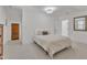 Bedroom with carpet flooring and a queen-sized bed at 406 E Whitaker Mill Rd, Raleigh, NC 27608