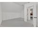 Bonus room with ample storage space, white walls, and neutral carpet at 406 E Whitaker Mill Rd, Raleigh, NC 27608