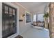 Welcoming front porch with a hanging swing, stone columns, and a stylish front door at 406 E Whitaker Mill Rd, Raleigh, NC 27608