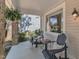 Charming front porch featuring comfortable seating and natural light, creating an inviting outdoor space at 406 E Whitaker Mill Rd, Raleigh, NC 27608
