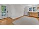 Bright kitchen area with white walls, light wood cabinets, and stainless steel appliances at 406 E Whitaker Mill Rd, Raleigh, NC 27608