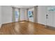 Inviting living room with beautiful hardwood floors, perfect for entertaining and comfortable living at 406 E Whitaker Mill Rd, Raleigh, NC 27608