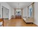 Spacious living room with hardwood floors and ample seating, creating a comfortable and stylish living space at 406 E Whitaker Mill Rd, Raleigh, NC 27608