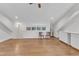 Open basement area boasts hardwood floors, ample lighting, and a convenient kitchenette at 406 E Whitaker Mill Rd, Raleigh, NC 27608