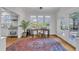 Bright office space with natural light and a charming antique desk at 406 E Whitaker Mill Rd, Raleigh, NC 27608