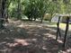 A spacious backyard with tall trees offers plenty of shade and privacy at 417 Sunnyview Rd, Henderson, NC 27536