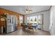 Bright dining area with large windows overlooking a large lawn at 4240 Friendship Rock Creek Rd, Burlington, NC 27215