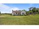 Classic single-story home featuring a well-kept lawn and inviting facade at 4240 Friendship Rock Creek Rd, Burlington, NC 27215