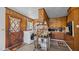Well-lit kitchen area with modern appliances, a laundry area, and ample storage at 4240 Friendship Rock Creek Rd, Burlington, NC 27215