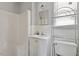 Full bathroom with a stand-up shower, white vanity and stainless steel fixtures at 4412 Green Spring Dr, Garner, NC 27529