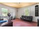 Bedroom with multiple windows and unique ceiling, offering ample space for customization at 4412 Green Spring Dr, Garner, NC 27529