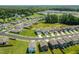 This residential neighborhood showcases well-maintained homes, lush green spaces, and convenient street layouts at 444 Campbell Ridge Pl, Wendell, NC 27591