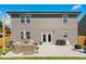 Back patio and backyard featuring an outdoor seating area and string lights at 444 Campbell Ridge Pl, Wendell, NC 27591
