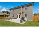 Back patio and backyard featuring an outdoor seating area and string lights at 444 Campbell Ridge Pl, Wendell, NC 27591
