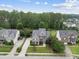 Aerial view of a charming home with mature trees and a well-manicured lawn at 501 Ivyshaw Rd, Cary, NC 27519