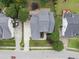 Aerial view of home and landscaping with mature trees and well-maintained lawn at 501 Ivyshaw Rd, Cary, NC 27519