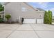 Side-entry three-car garage with ample parking space at 501 Ivyshaw Rd, Cary, NC 27519