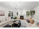 Comfortable living room with fireplace and neutral decor at 501 Ivyshaw Rd, Cary, NC 27519