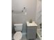 Updated bathroom features a modern gray vanity, a white toilet, and combined shower and tub at 501 Morgan Ter, Burlington, NC 27217
