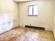 Simple, empty bedroom with a window, providing a minimalist, functional space at 525 Locust Rd, Hillsborough, NC 27278