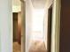 Bright hallway leading to various rooms, providing easy access throughout the home at 525 Locust Rd, Hillsborough, NC 27278