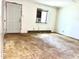Simple living room with a window unit air conditioner and access to the exterior at 525 Locust Rd, Hillsborough, NC 27278