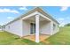 New backyard with patio and freshly installed sod, ready for outdoor enjoyment at 528 Lochalsh Dr, Gibsonville, NC 27249