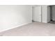 Bedroom with plush carpeting and multiple doorways for easy access to other areas at 528 Lochalsh Dr, Gibsonville, NC 27249