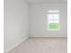 Bright bedroom featuring neutral carpet and natural light from the window at 528 Lochalsh Dr, Gibsonville, NC 27249