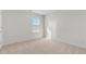 Cozy bedroom with soft carpet and bright window, ready for relaxation and rest at 597 Leven Dr, Gibsonville, NC 27249