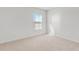 Cozy bedroom with soft carpeting, a window for natural light, and freshly painted walls at 597 Leven Dr, Gibsonville, NC 27249