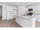 Beautiful kitchen with granite counters, white cabinets, and stainless steel appliances at 597 Leven Dr, Gibsonville, NC 27249