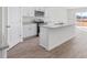 Kitchen with white cabinets, granite countertops, and stainless steel appliances at 597 Leven Dr, Gibsonville, NC 27249