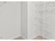 A walk-in closet with wire shelving provides ample storage space for clothing and accessories at 597 Leven Dr, Gibsonville, NC 27249