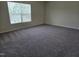 Bedroom with carpet, a window, and plenty of space at 6408 Bunker Hill Dr, Raleigh, NC 27610