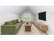 Inviting attic space that can be used as a media room, living room, or office at 716 Beddingfield Dr, Knightdale, NC 27545