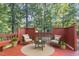 Outdoor deck boasts comfortable seating and a cozy ambiance, perfect for relaxation at 716 Beddingfield Dr, Knightdale, NC 27545