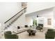 Cozy living room with fireplace, comfortable seating, and lots of natural light at 716 Beddingfield Dr, Knightdale, NC 27545