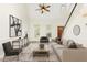 Bright and airy living room with vaulted ceiling, neutral decor, and abundant natural light at 716 Beddingfield Dr, Knightdale, NC 27545